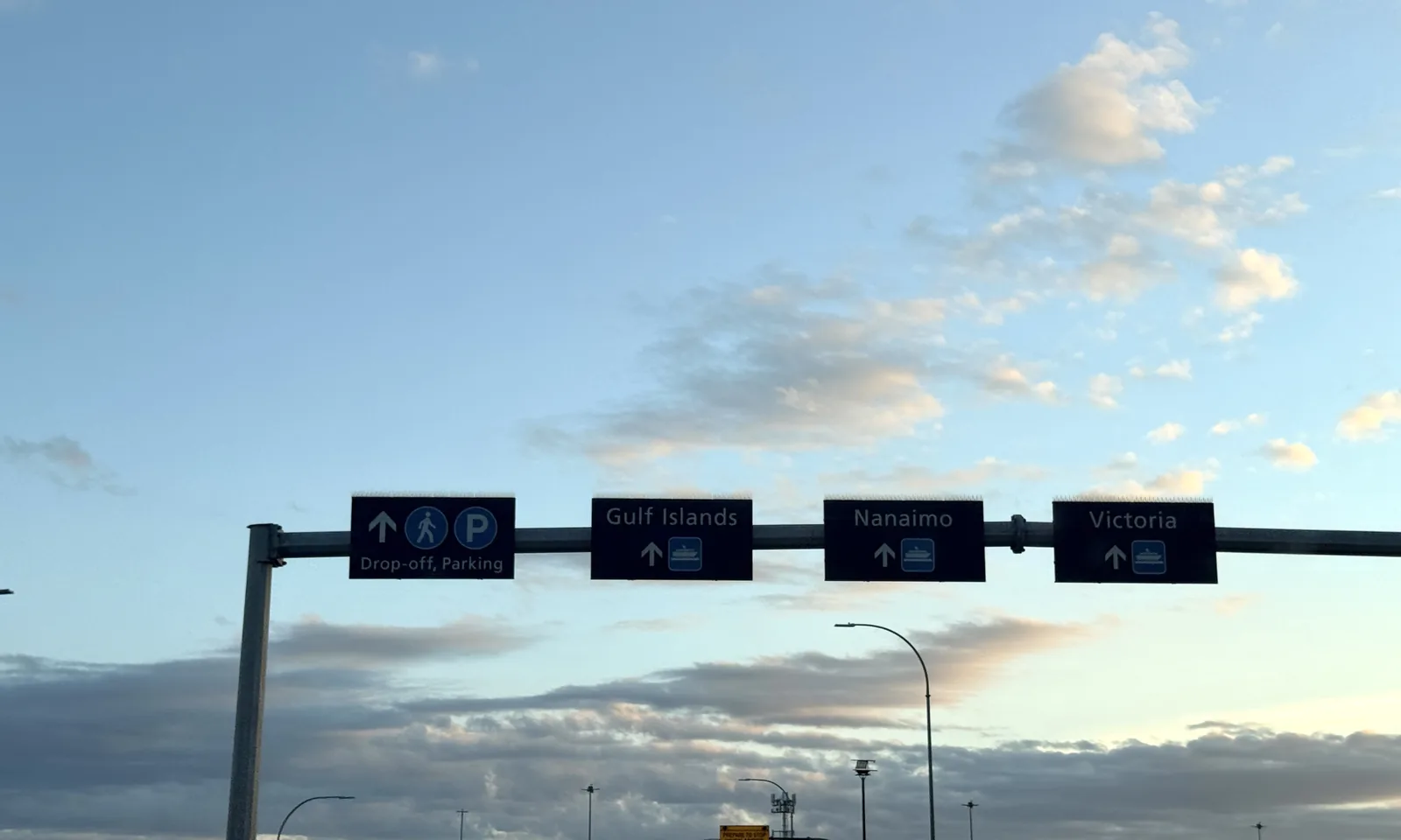 Overhead lane signs on the approach to Tsawwassen Ferry Terminal: Drop-off and Parking, Gulf Islands, Nanaimo, Victoria